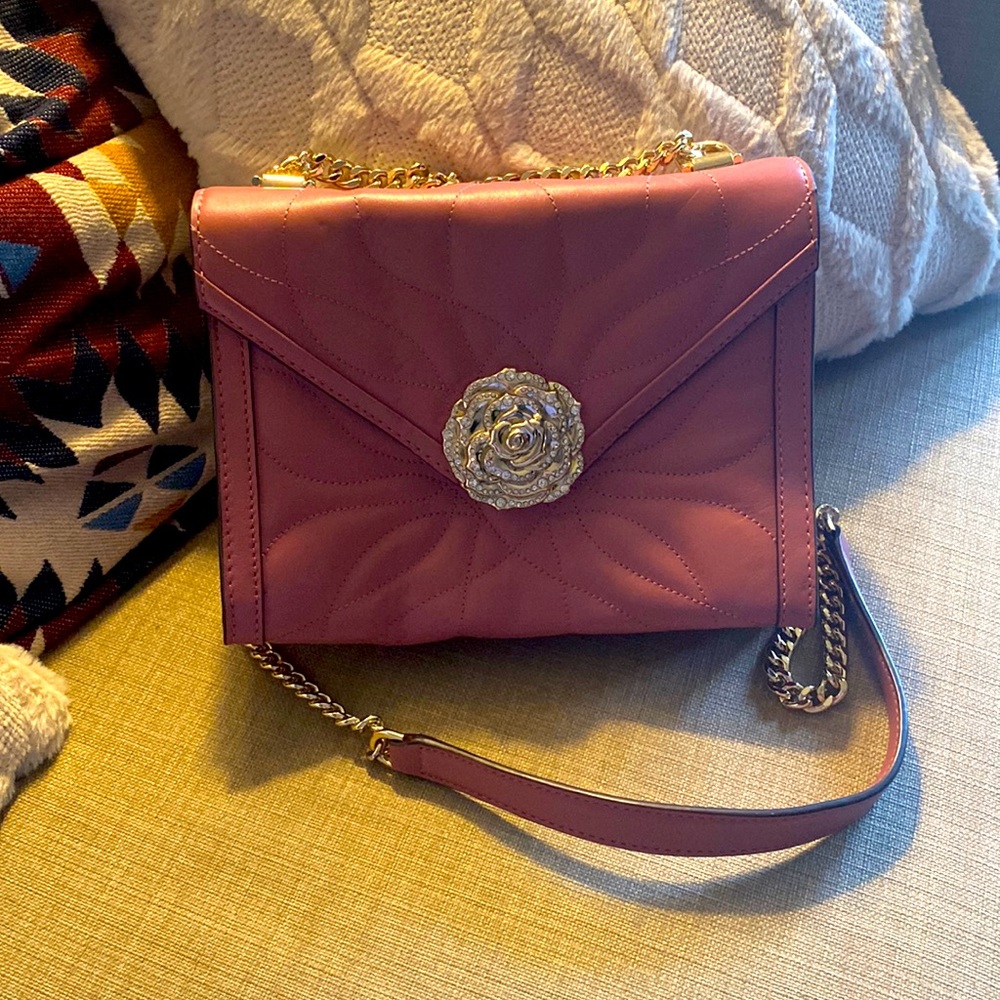 Michael Kors light pink flowered bag with clasp